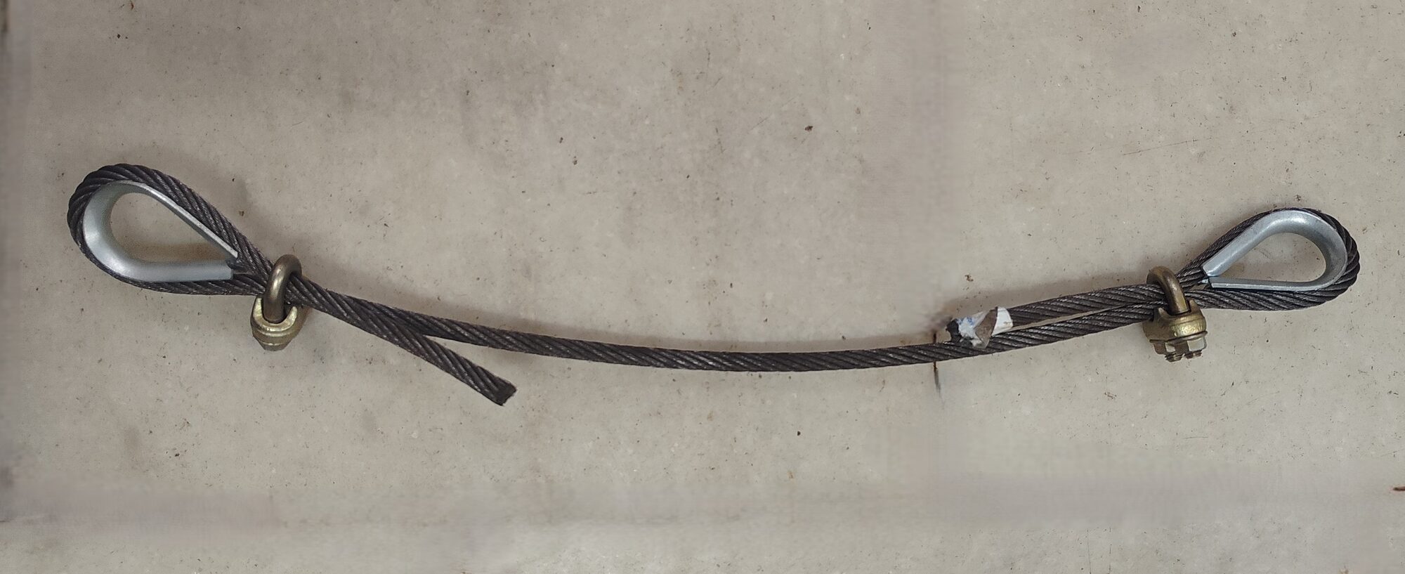 Tensile testing on single-strand armored wireline cables per ASTM A931